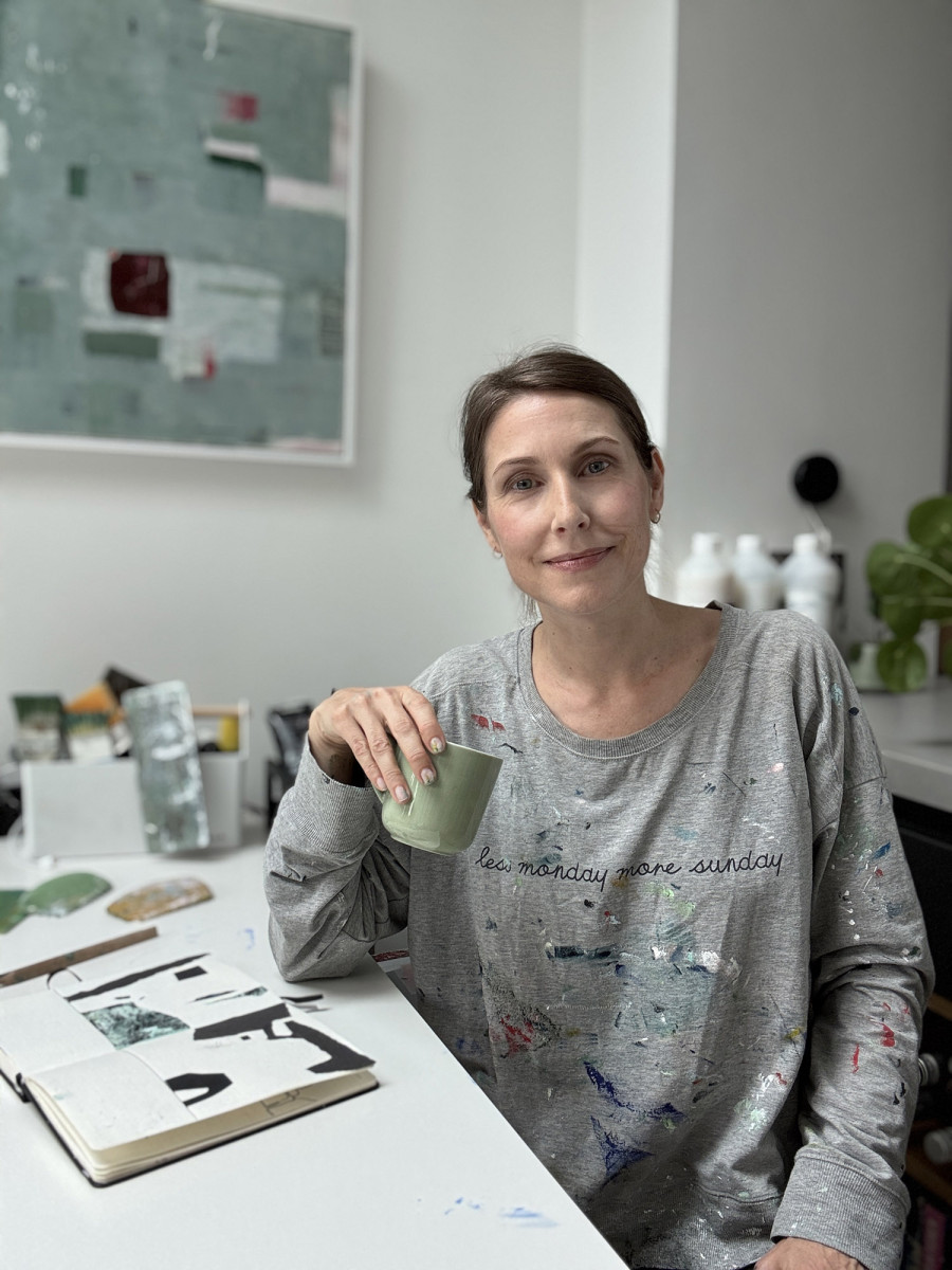 Julika Pettigrew portrait with workbook