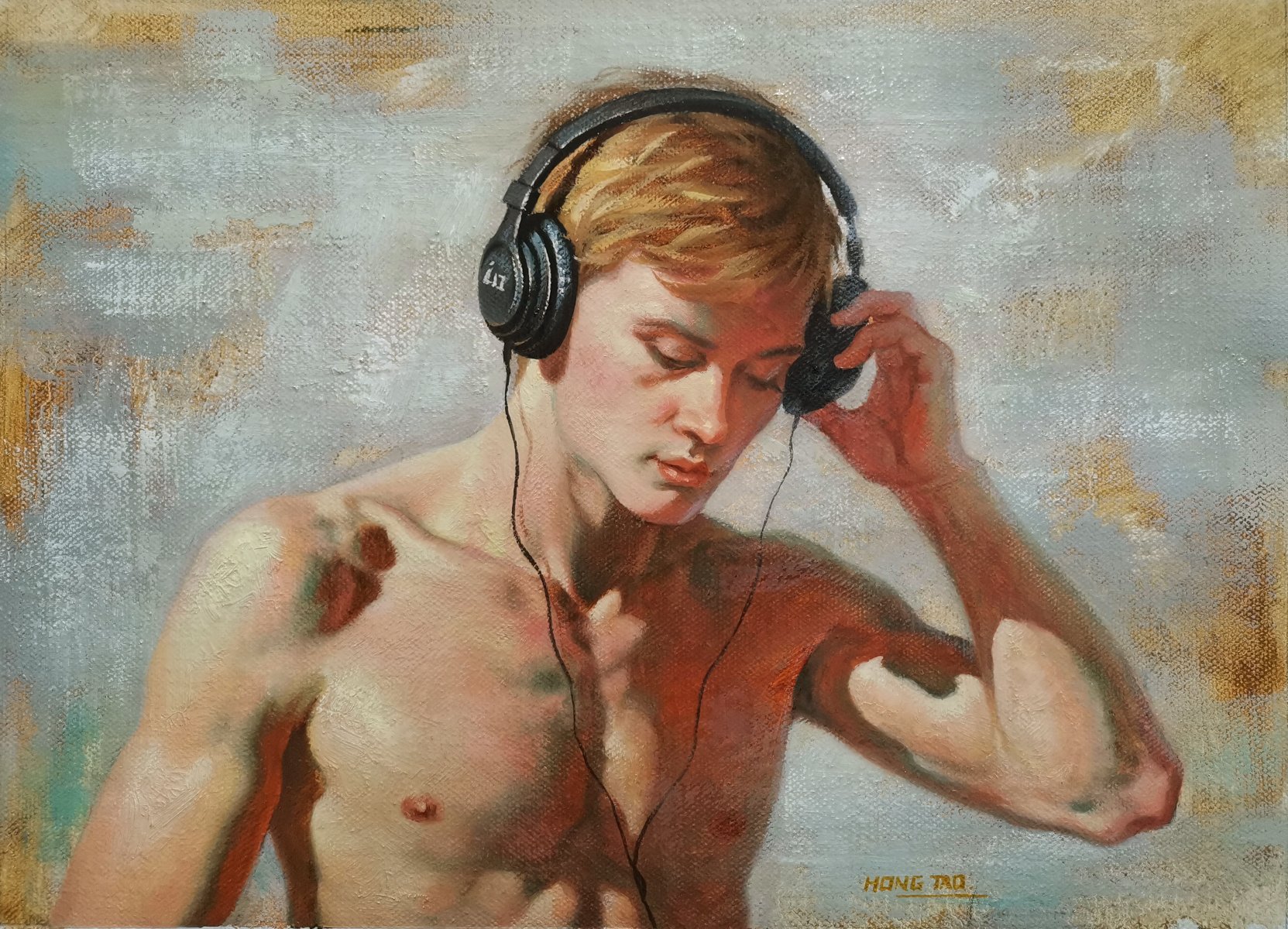 The man wearing headphones